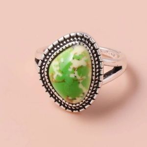 Textured green fancy ring.